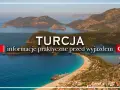 Piękna zatoka z łodziami i górami. Informacje praktyczne przed wyjazdem do Turcji.