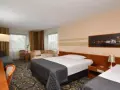 Co to jest suita w hotelu? Odkryj jej zalety i różnice z pokojem